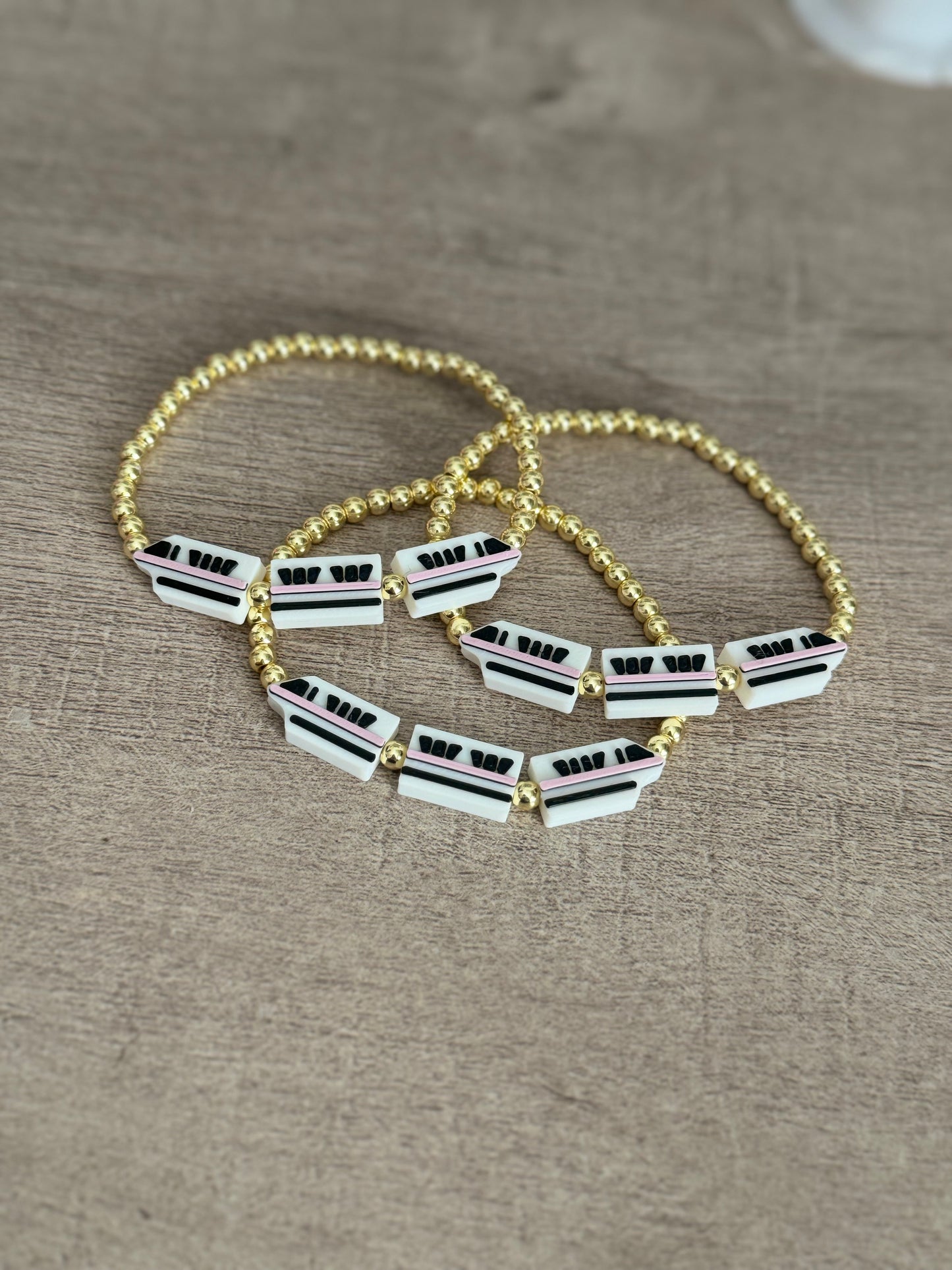 Pink Monorail + Gold Bracelet