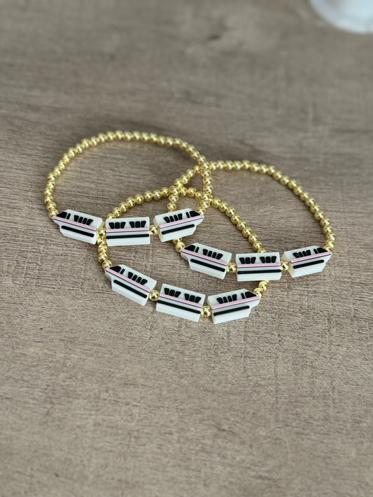 Pink Monorail + Gold Bracelet